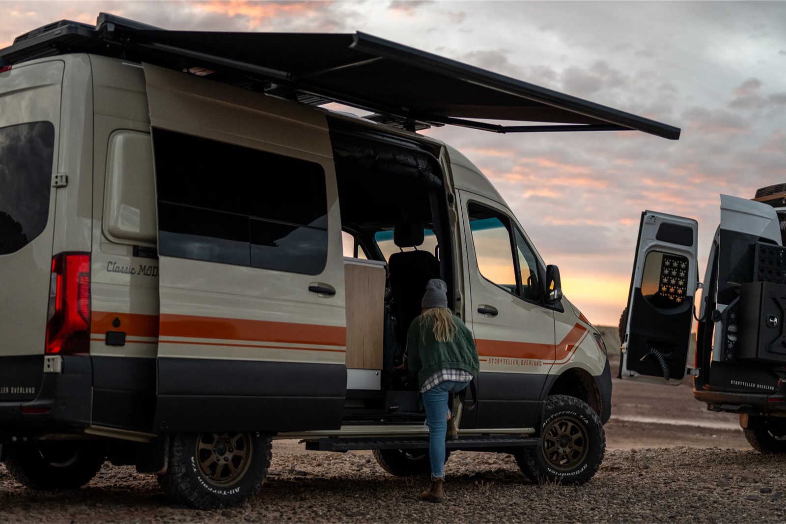 Storyteller van with the awning extended at sunset