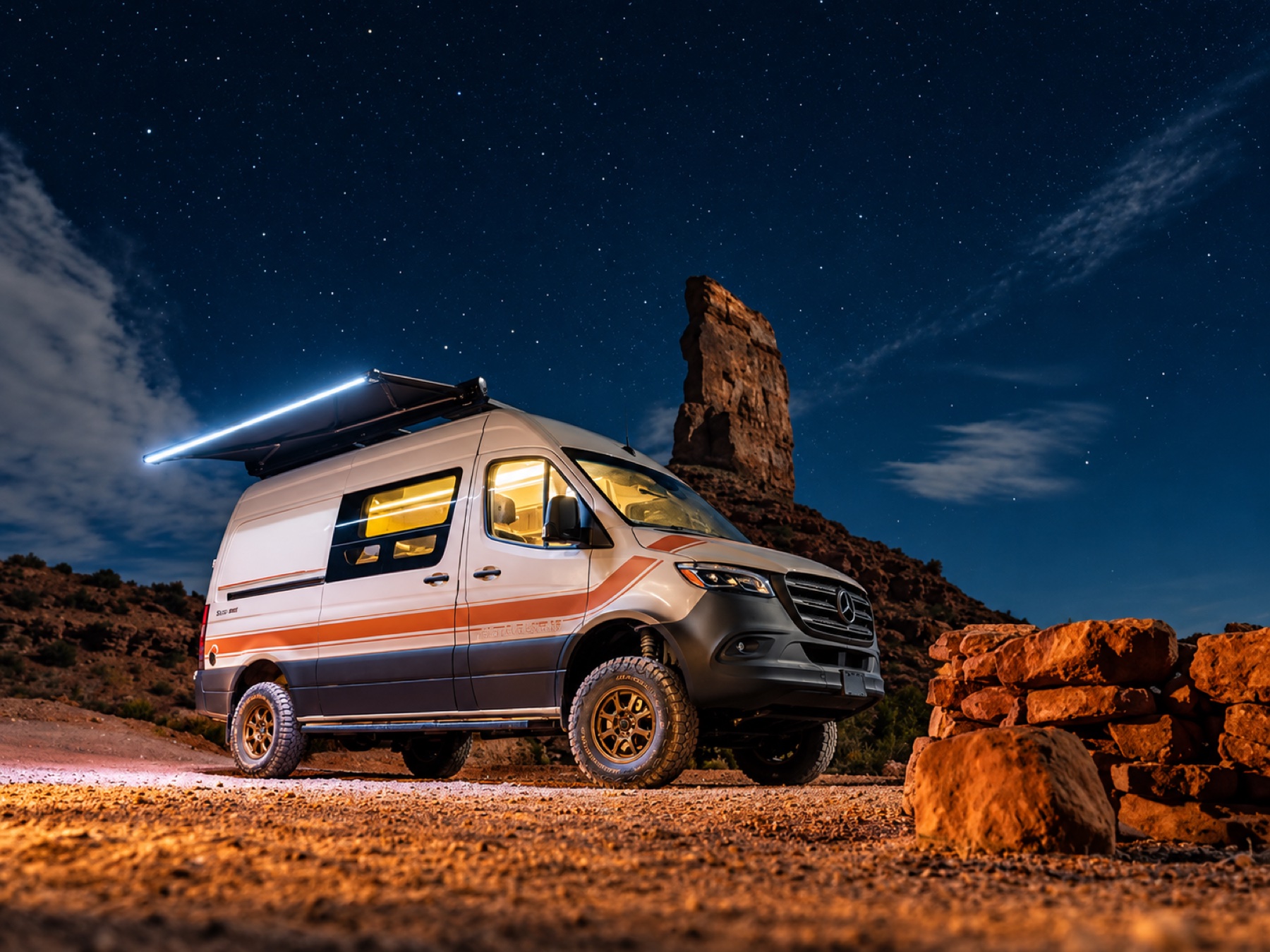 Illustration of a Storyteller adventure van under a starry desert sky